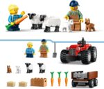 Trattore agricolo rosso con rimorchio e pecore - immagine 3