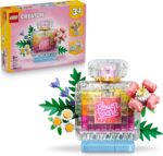 Boccetta di profumo con decorazione floreale